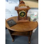 A late 19th century American walnut mantel clock A/F, together with an early 20th century oak