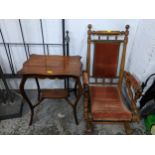An early 20th century oak framed American rocking chair and a walnut occasional table Location: