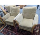 An Ercol two seater sofa and two matching armchairs Location: