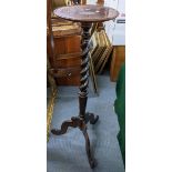 A Victorian mahogany torchere stand having a barley twist column and three cabriole legs, 109.5cm