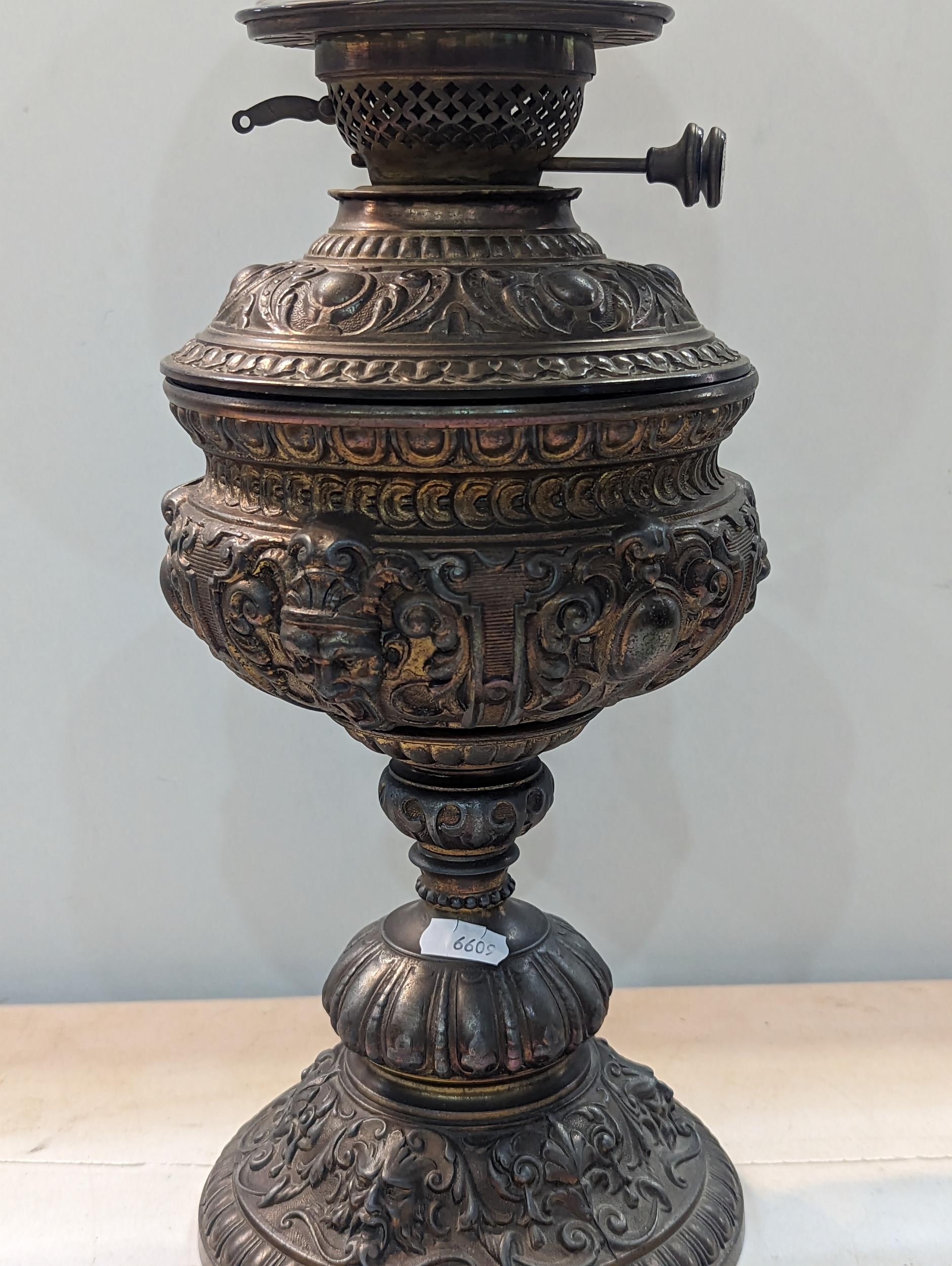 A Victorian embossed decorated brass oil lamp, with frosted shade Location: A3M - Image 2 of 3