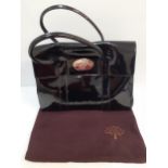 Mulberry-A black patent Bayswater handbag with silver tone postman's lock to the front flap,