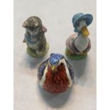 A Royal Crown Derby paperweight in the form of a Robin, along with Beatrix Potter Beswick Jemima