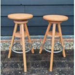 A pair of potter's beech adjustable stools. Location:BWR