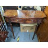 A reproduction mahogany serpentine fronted two drawer side table Location: