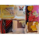 A quantity of vintage designer scarves, mainly silk examples to include Leonard, Eric d'Ormel,