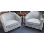 A pair of modern grey chenille upholstered tub chairs Location: RAB
