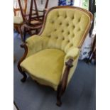 A Victorian mahogany armchair having scrolled arms and on front cabriole legs Location: