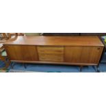 A mid 20th century teak sideboard by Clausen & Son having two sliding doors and four drawers 74.