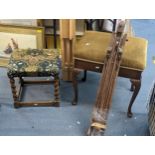 A light wood artist easel and one other small example along with a green top piano stool and a