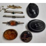 Late Victorian and early 20th Century costume jewellery to include 2 carved ebony brooches and bar