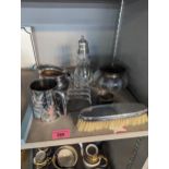 Silver to include a sugar caster, brush dressing table pot, a napkin ring and silver plate Location: