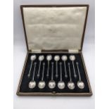 A cased set of twelve 1920s silver coffee bean spoons, hallmarked Sheffield 1928, 99.5g, Location: