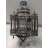 A Moroccan light shade having pierced decoration and rounded finials, A/F, Location: