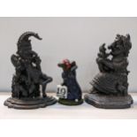 A pair of Victorian cast iron Punch and Judy door stops, 31h, together with a door stop in the