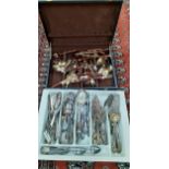 A canteen of treen and copper cutlery together with mixed silver and silver plated cutlery and