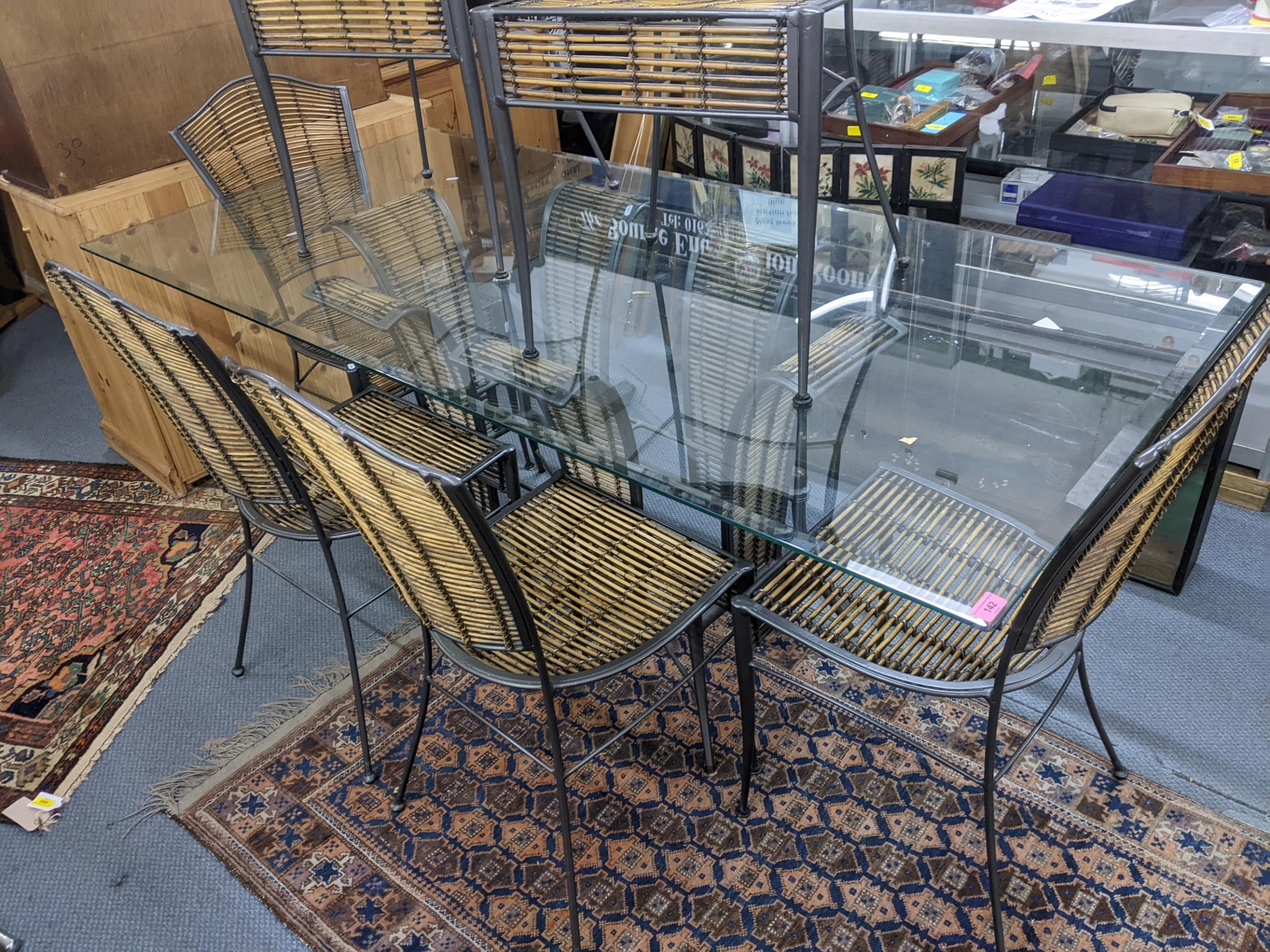 A wrought metal and bamboo framed dining table having a glass top, 76h x 190w, together with six - Image 2 of 2