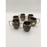 Six continental sterling silver miniature tankards with embossed detail, total weight 98.2g,