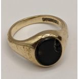 A 9ct gold signet ring set with a stone, A/F, 8.6g, Location: