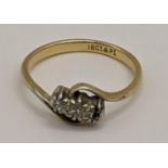 A 18ct gold ring set with diamonds, total weight 2.4g Location: