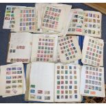 Three albums and loose pages of 19th century and later mixed stamps from around the world to include