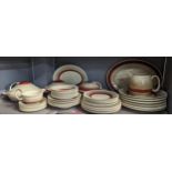 A group of Susie Cooper red wedding band items to include plates, bowls, tureens, jug and others