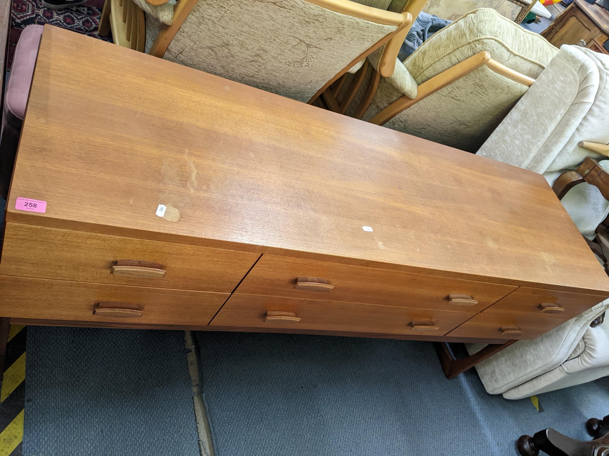 A retro teak sideboard having two long drawers flanked by four short drawers, 71h x 15w, Location: - Image 3 of 3