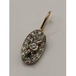 An 18ct white and yellow gold diamond pendant, 1.9g, Location: