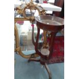 A reproduction treen torchere, together with a mid 20th century gold painted wall mirror and a mid