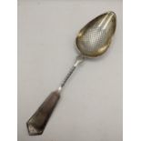 A continental white metal straining spoon having a beaded band and twisted column, 624g, Location: