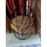 Three wall hanging wrought metal hay feeder planter, Location: