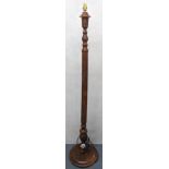 A vintage Anglo-Indian carved hardwood stand lamp with vine decoration, re-wired and PAT-tested