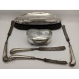 An early 20th century silver dressing table brush, together with a silver jewellery box and four