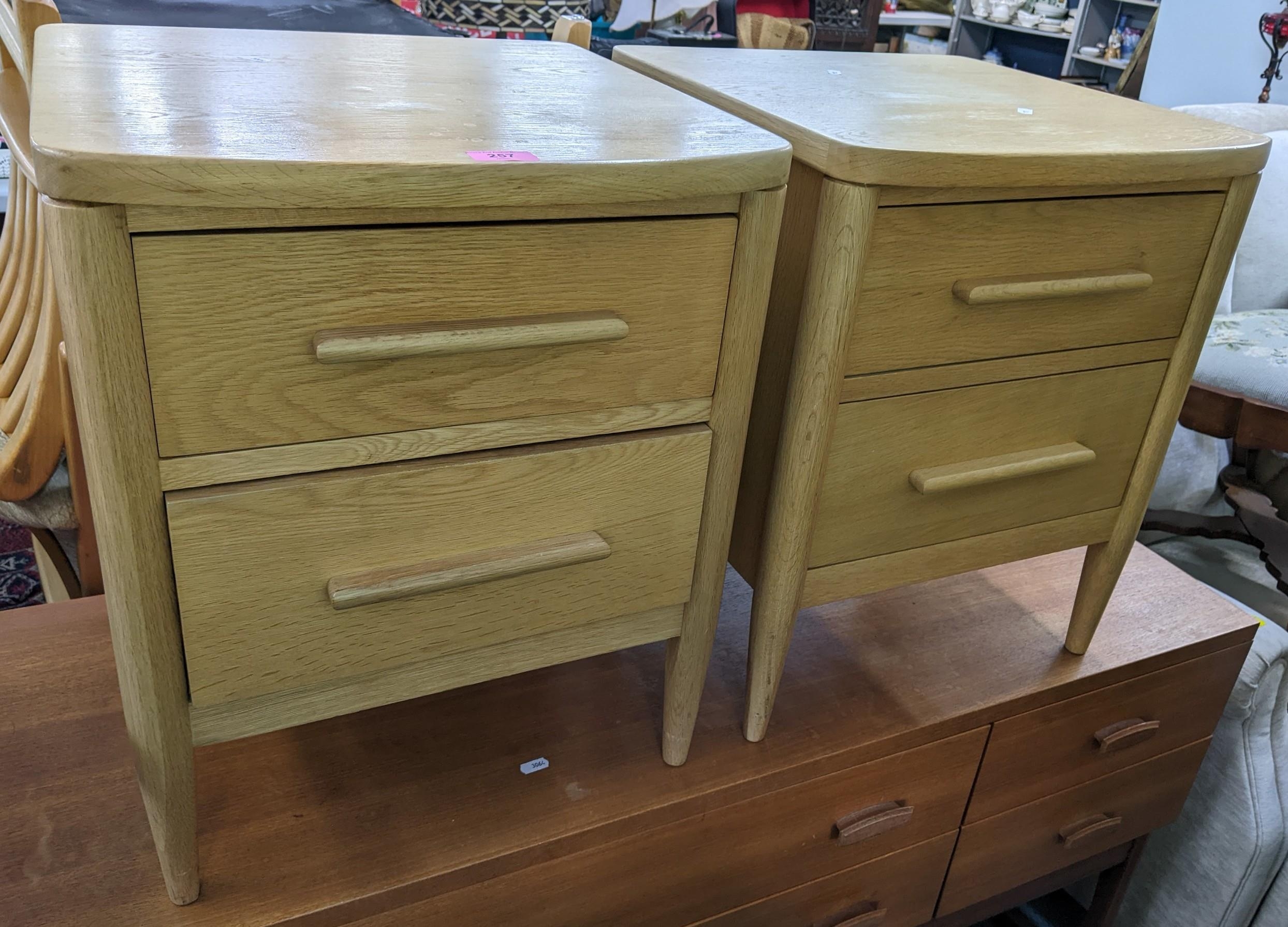 A pair of modern Ercol Chiltern, two drawer bedside tables, 55h x 45w, Location: