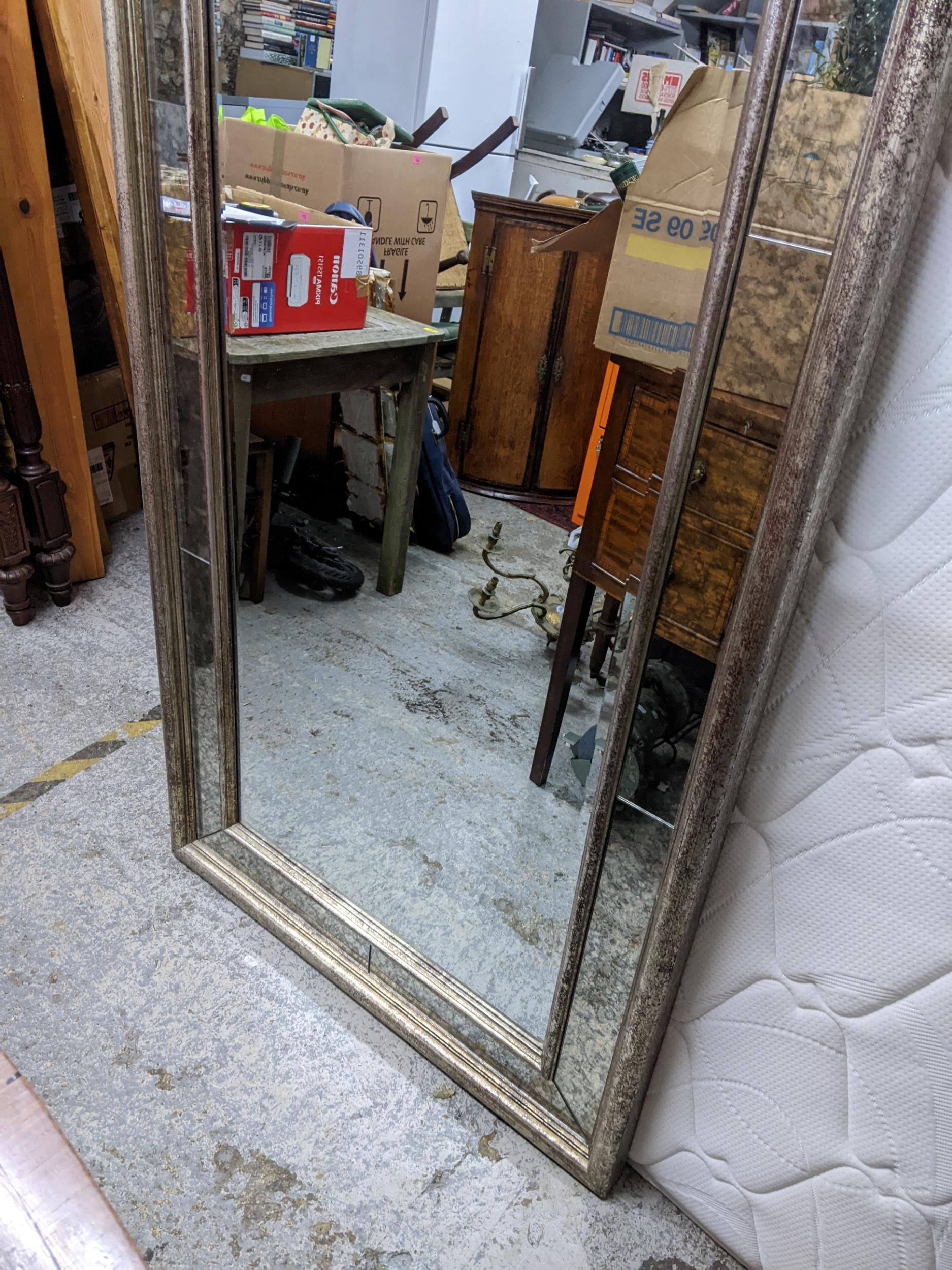 A large modern silver coloured rectangular shaped wall mirror, inset with bevelled glass, 175h x - Image 3 of 3