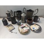 Mixed items to include pewter tankards, a silver plated twin handle trophy cup, cigarette case,