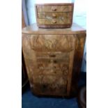 An Art Deco walnut sewing cabinet and contents and a matching tabletop chest and contents Location: