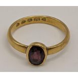 A 22ct gold ring set with an oval cut amethyst, total weight 4.2g Location: