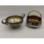 A white metal twin handled bowl, together with a white metal basket, both stamped to the base, 389.