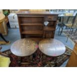 A mid 20th century oak Old Charm bookcase, 87.5 h x 93w, together with a pair of oak circular topped