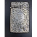 A late Victorian silver cigarette case engraved with initials, hallmarked Chester 1894, 42.3g