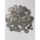 Mixed British pre 1947 half crowns, Florins and Shillings, along with a 1873 1886 three pence and