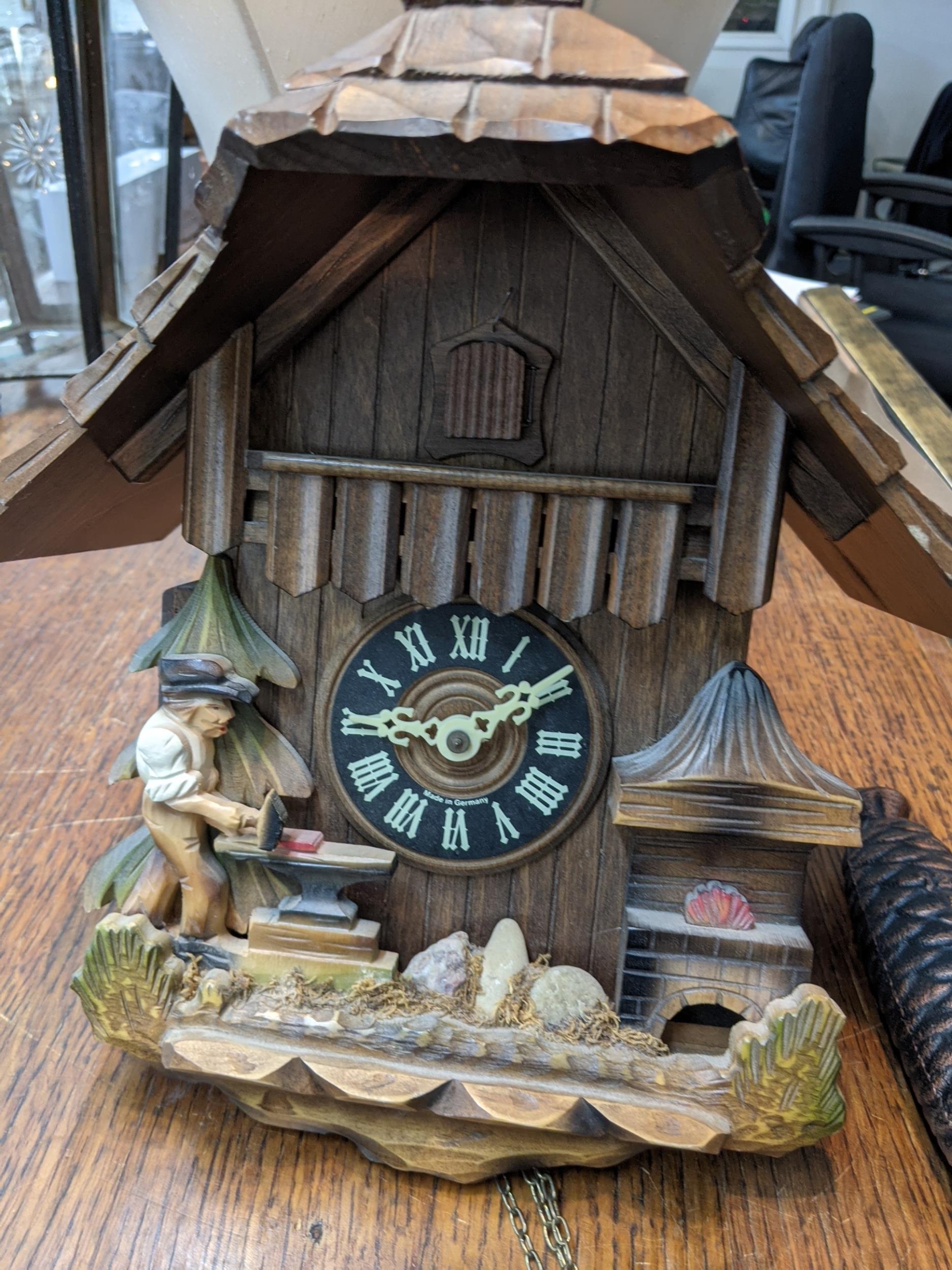 A vintage Black Forest Cuckoo clock in the style of architectural form, together with two weights - Image 2 of 3