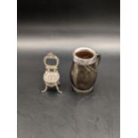 A silver miniature Victorian style chair together with a miniature tankard with a silver rim