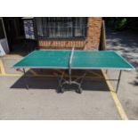A Ketler outdoors folding table tennis table Location: