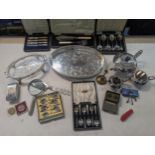 Silver plate to include a tea set, flatware, silver handled knives, a magnifying glass and other