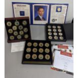 A Danbury Mint Racing Legends Medallion Collection, cased set of twelve 22ct gold plated