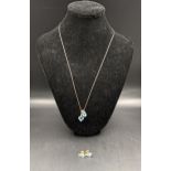 A 14ct gold double pendant necklace together with a pair of earrings, total weight 5.9g Location: