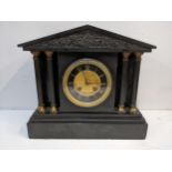 A Victorian black slate 8-day mantel clock of architectural design, the dial signed J.D Fisher Paris