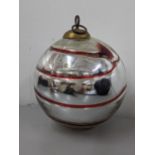 A large Kugel glass Christmas ornament having a silver and red swirl design, 18cm high Location: